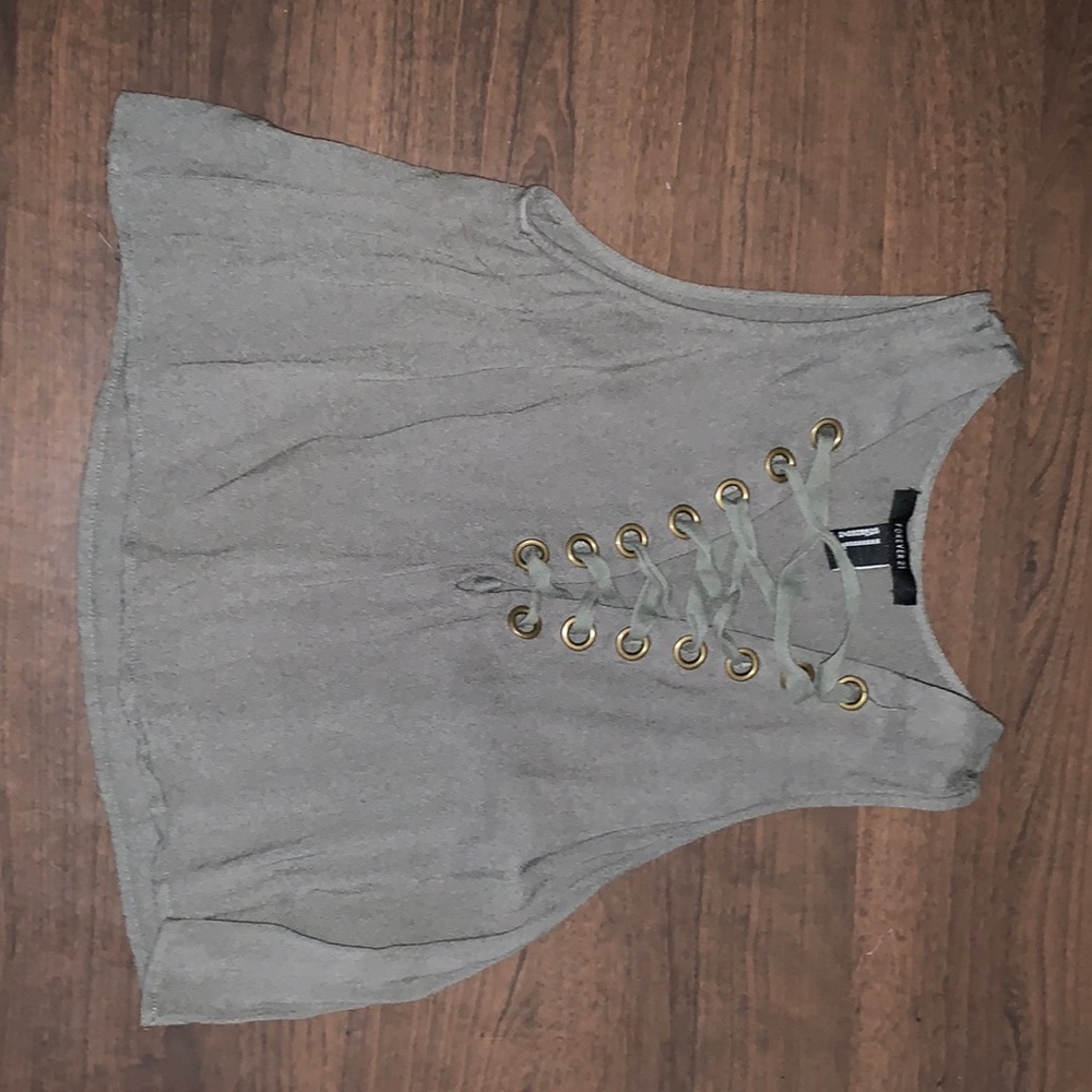 A cropped olive green shirt